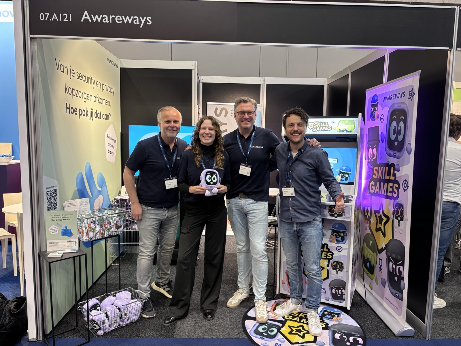 Picture of Awareways employees at a Cybersecurity Event. 